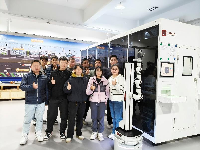 SJ Tech company team group photo